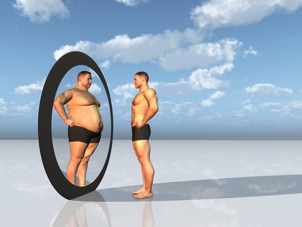 This picture shows how someone with Body Dysmorphic Disorder (BDD) can see themselves, versus how they actually look. This disorder can encourage them to exercise and fast to the point of being too thin. https://breakingmuscle.com/learn/the-modern-male-an