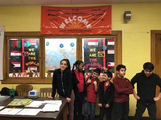 Some of the kids seeing their showcase for the first time! Photographed (left to right): Yalda, Rougeya, Seraj, Hashmatuallah, Mohamed, & Nawi