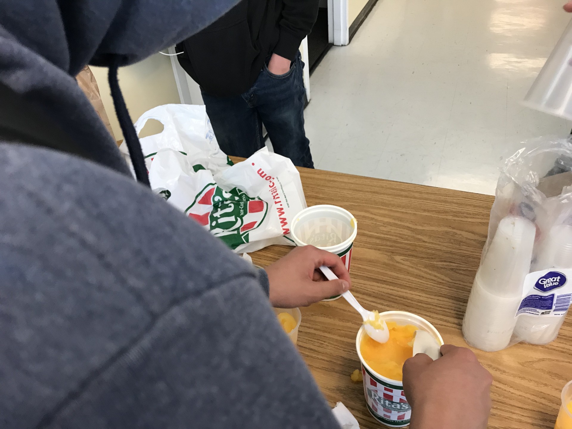 My other classmate and close friend, Randy, serving water ice.