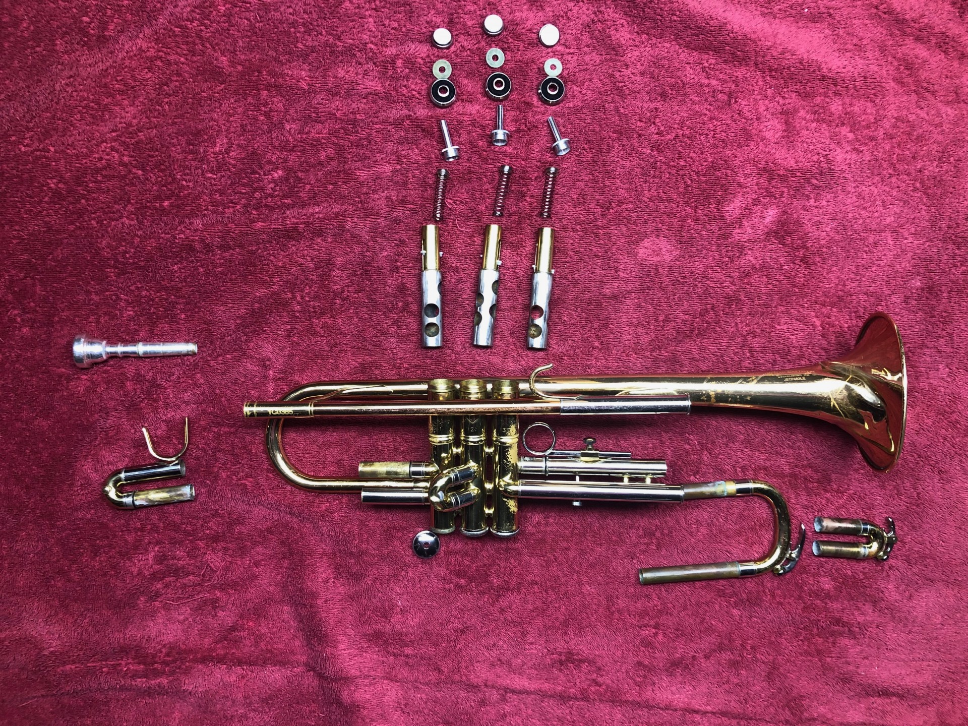 A disassembled trumpet