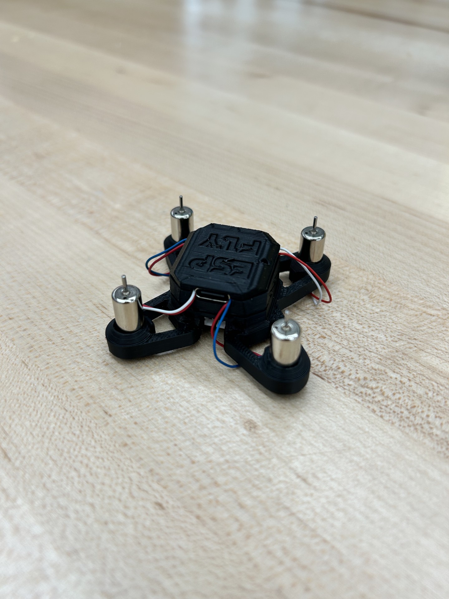 Assembled physical drone, with all parts on the 3D printed drone frame
